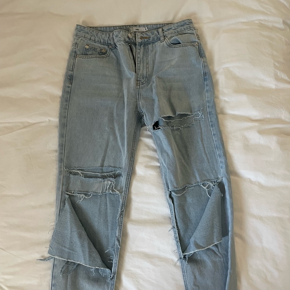 Brand nwt adika ripped jeans